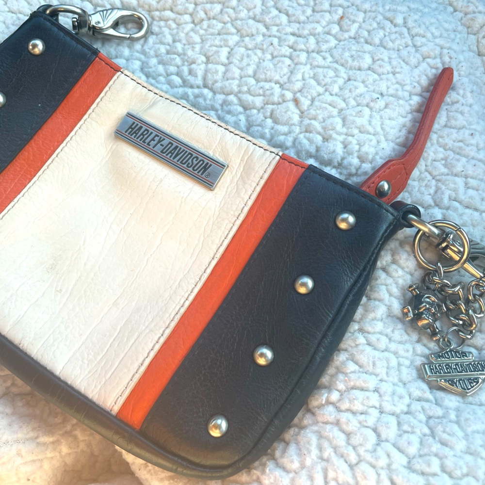 Beautiful black/white/orange Harley Davidson hi purse. Gently used.
